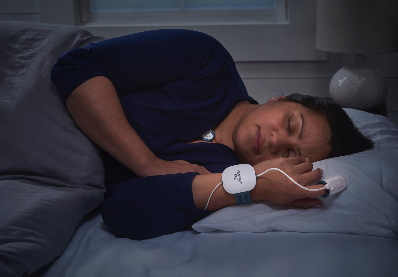 Patient sleeping comfortably at home during a home sleep study